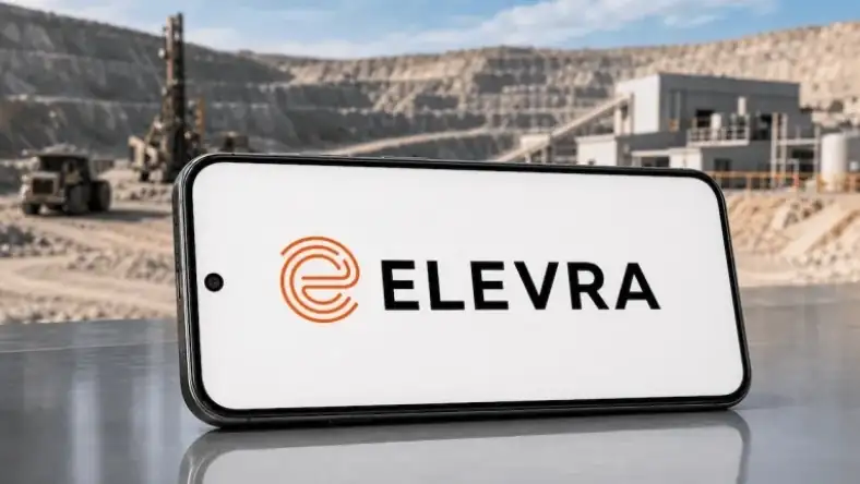 Elevra logo on a smartphone screen with an open-pit lithium mine and processing facility in the background